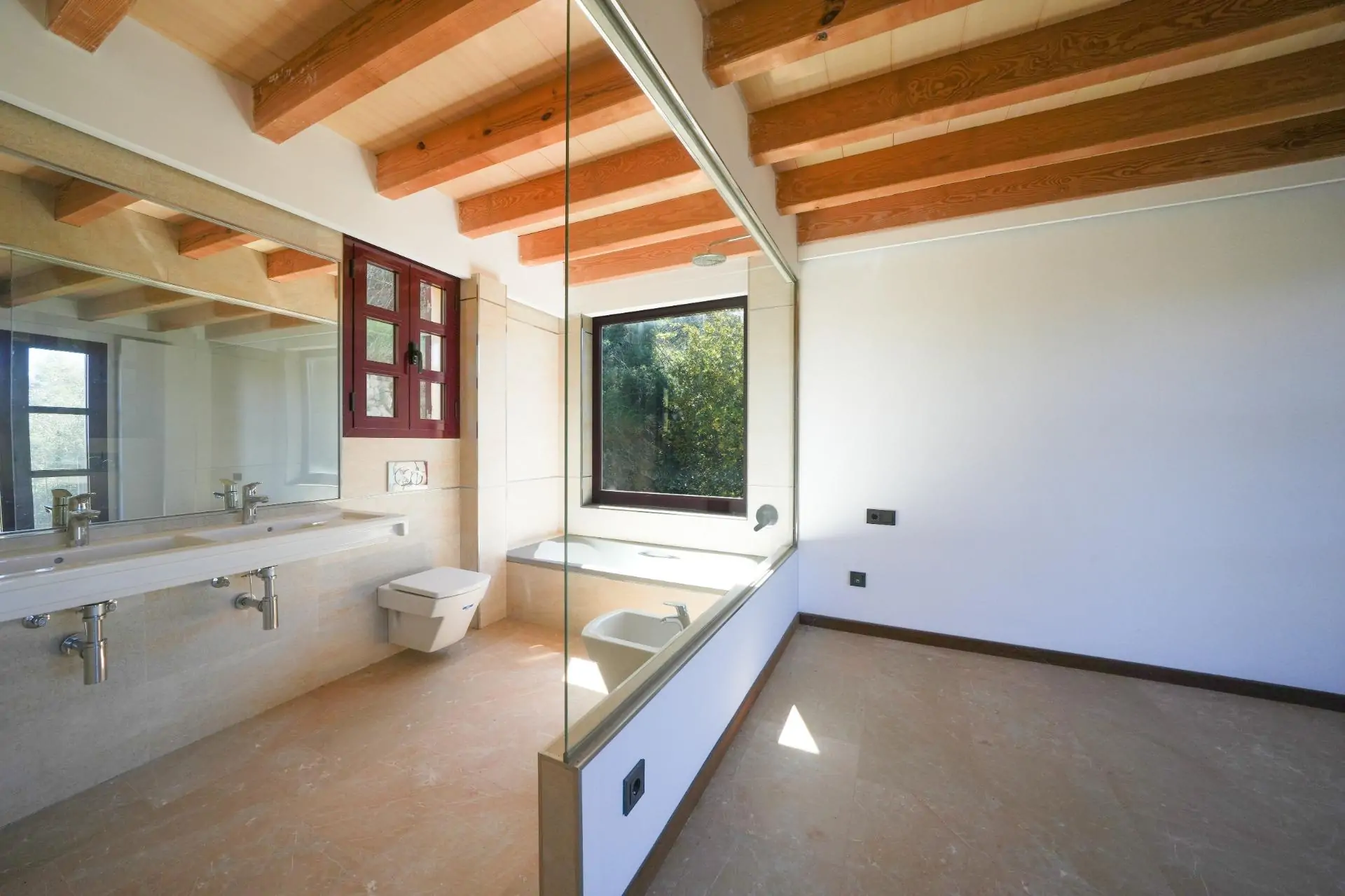 Fantástica propiedad con dos casas independientes de nueva construcción en Estellencs con vistas al mar.